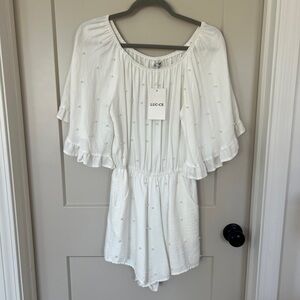 White Ruffled Romper by LUC-CE